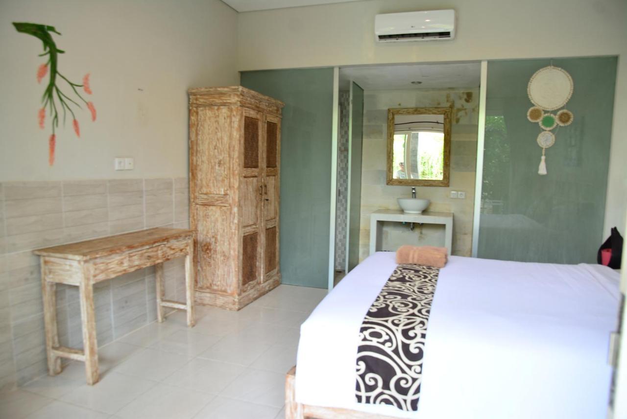 Asung Guesthouse Canggu Esterno foto